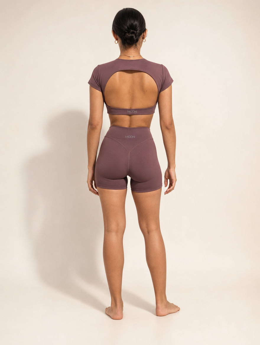 The Halo Set in Deep Umbra, back view showing the open circular back and the MOON band in deep plum.